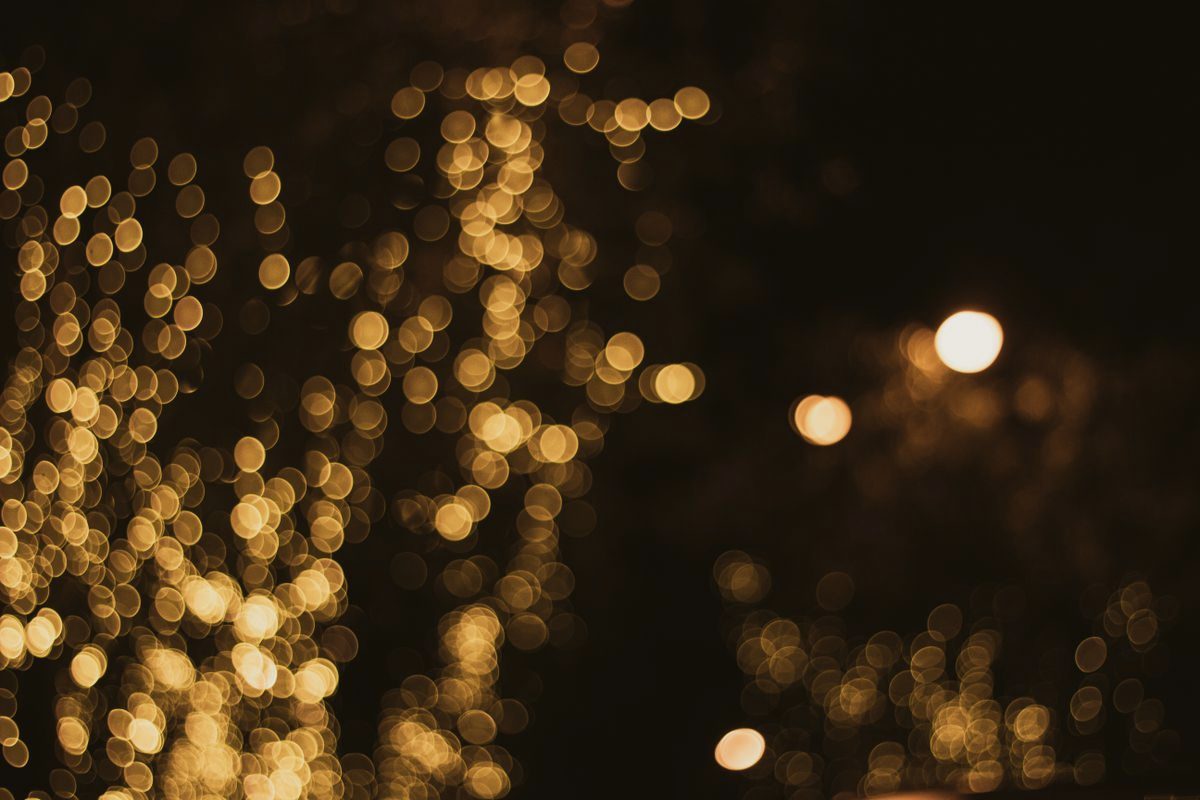 Golden bokeh lights in the dark
