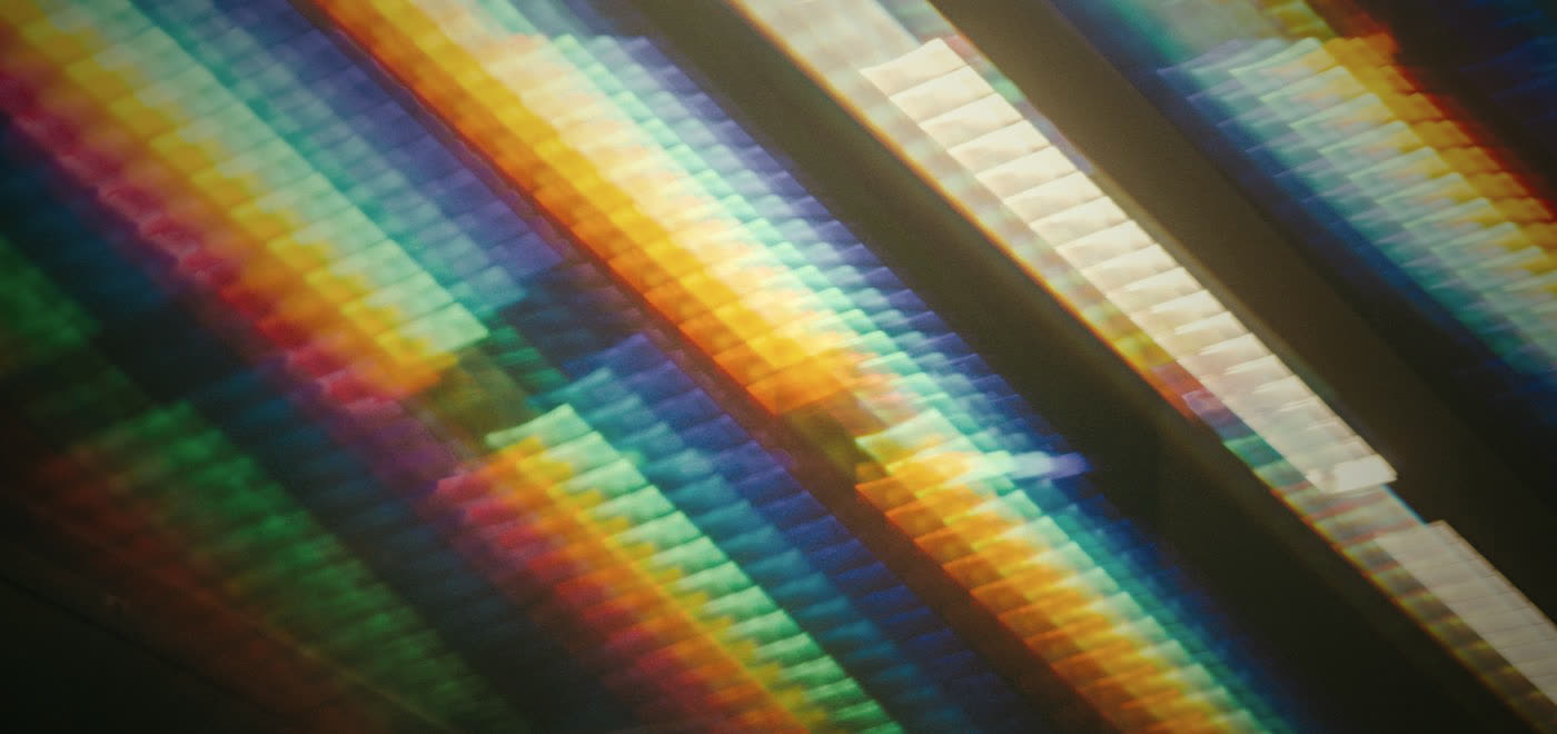 Abstract light spectrum on a reflective surface