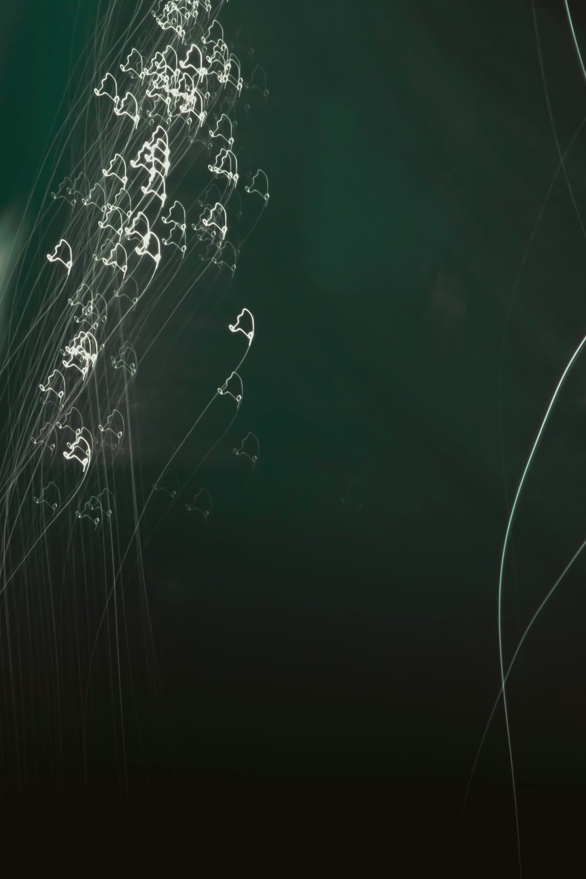 Abstract teal light streaks