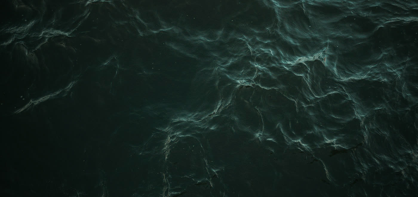 Abstract dark water texture from above